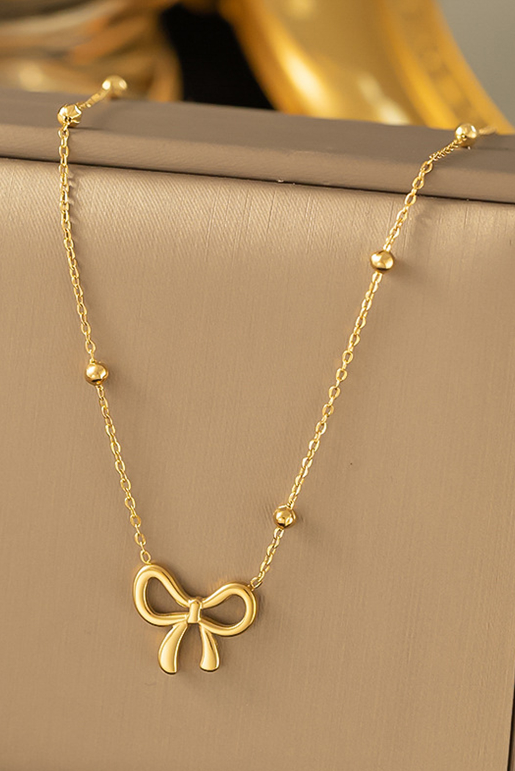 Gold Elegant Bow Design Plated Studded Earrings - loveforevers