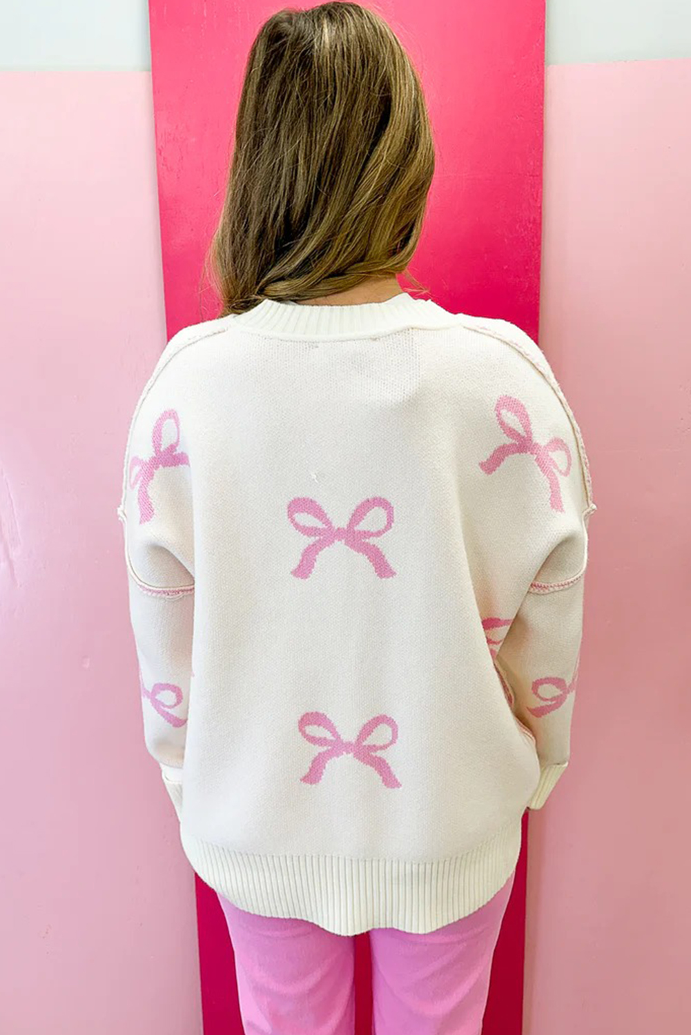 Pink Bow Print Ribbed Trim Exposed Seam Drop Shoulder Loose Sweater - loveforevers