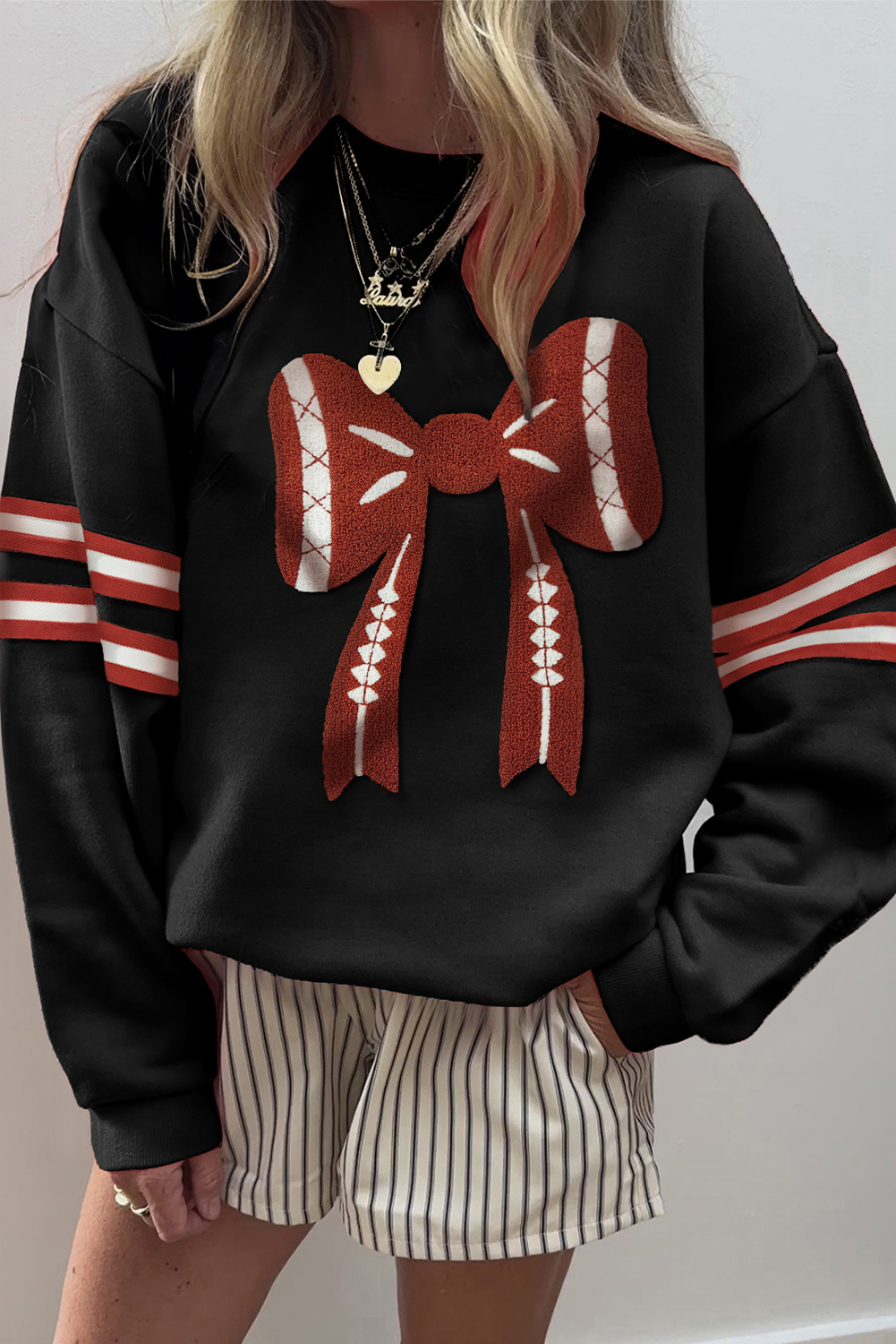 Black Varsity Baseball Bow Graphic Striped Sleeve Baggy Sweatshirt - loveforevers